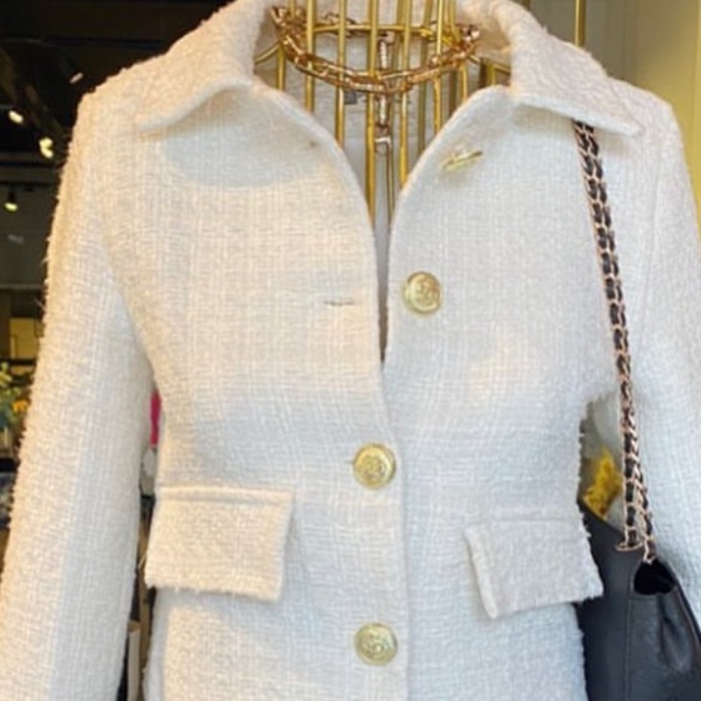 Ivory jacket with gold color buttons